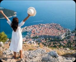 Woman in Italy on holiday watching the view after vision correction